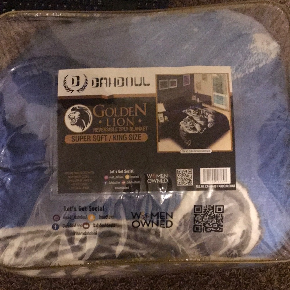 A blanket for $60 it has a picture of 2 tiger it’s dark blue not used new